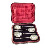 AN IMPRESSIVE SET OF FOUR VICTORIAN SILVER SERVING SPOONS