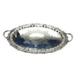 A VICTORIAN SILVER PLATED DOUBLE HANDLED TRAY