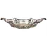 A LATE VICTORIAN SILVER BREAD BASKET