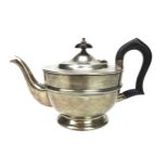 A GEORGE V SILVER TEAPOT