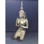 A LARGE WHITE METAL FIGURE OF A THAI MALE DEITY