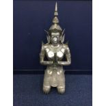 A LARGE WHITE METAL FIGURE OF A THAI FEMALE DEITY