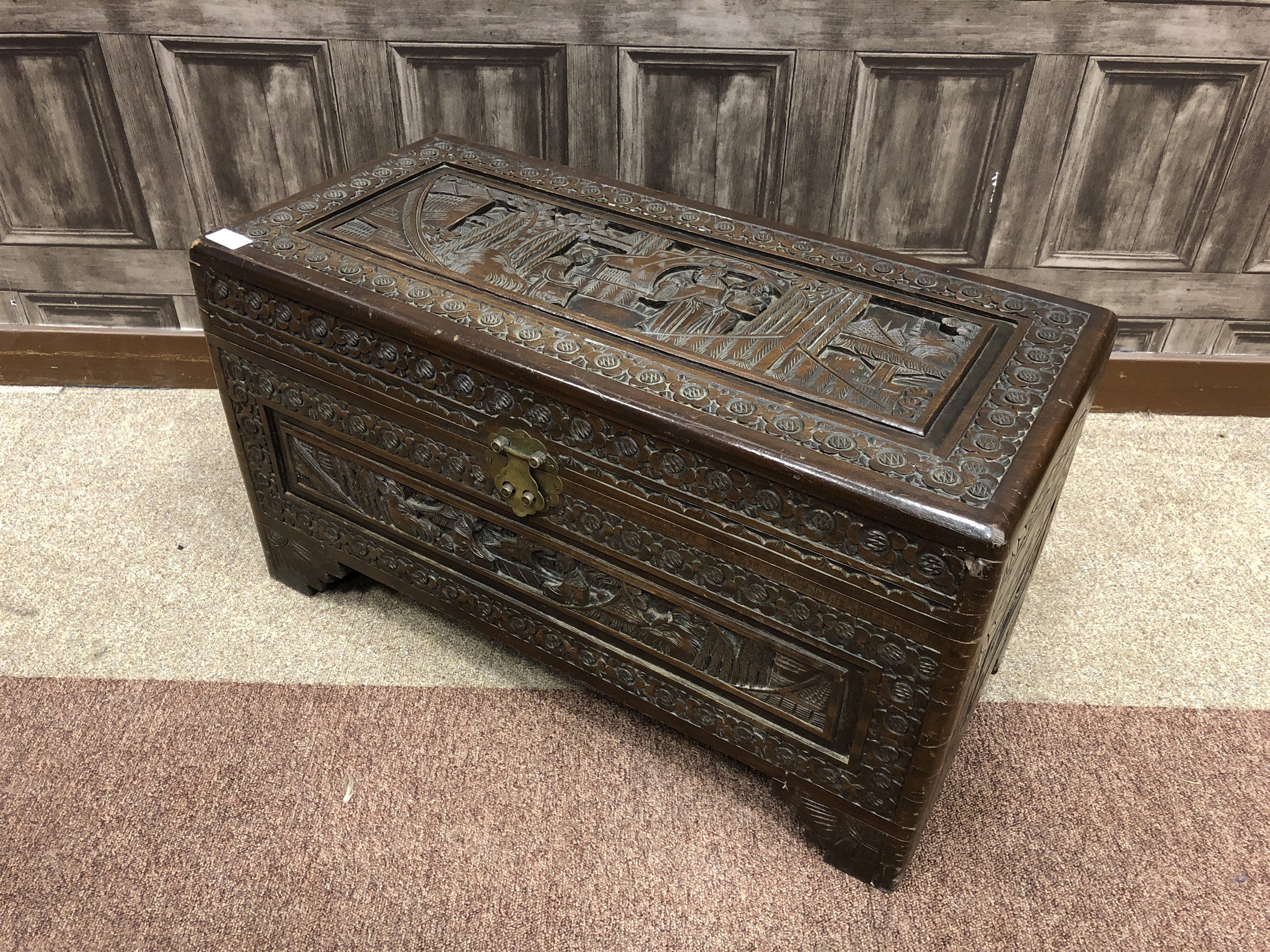 A CHINESE CARVED WOOD CHEST