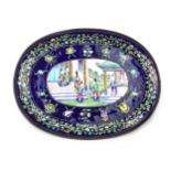 A CHINESE ENAMELLED PLATE