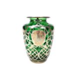 AN ART NOUVEAU SILVER OVERLAID GREEN GLASS VASE