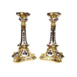 A PAIR OF ROYAL CROWN DERBY TABLE CANDLESTICKS