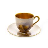 A ROYAL WORCESTER COFFEE CUP AND SAUCER BY A BARRY