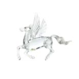 A SWAROVSKI CRYSTAL PEGASUS FIGURE AND A BIRD OF PEACE