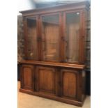 A VICTORIAN MAHOGANY CABINET BOOKCASE