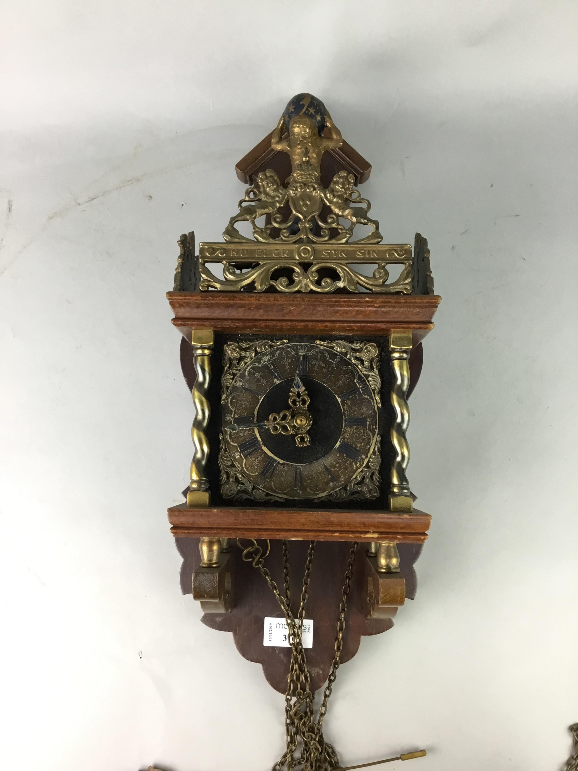 A LOT OF TWO STAINED WOOD WALL CLOCKS