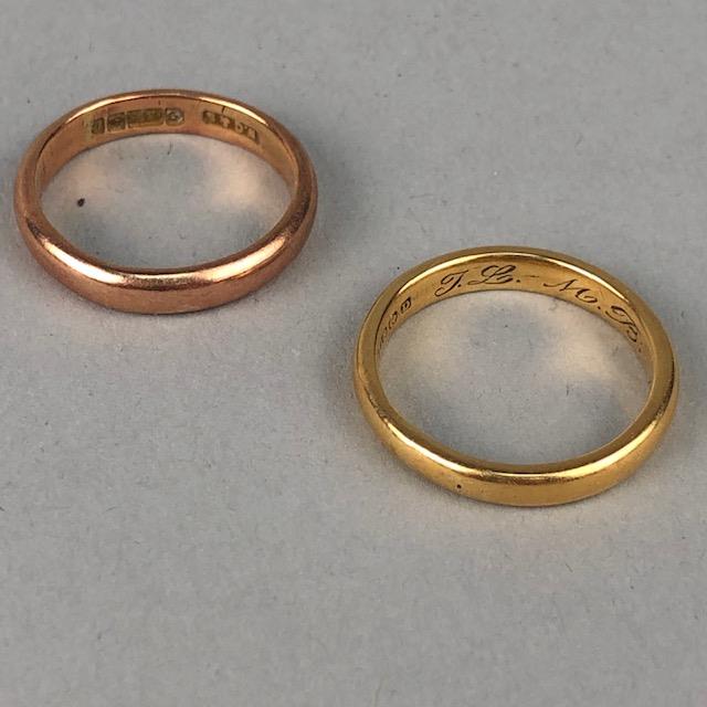 AN EIGHTEEN CARAT GOLD WEDDING BAND AND ANOTHER