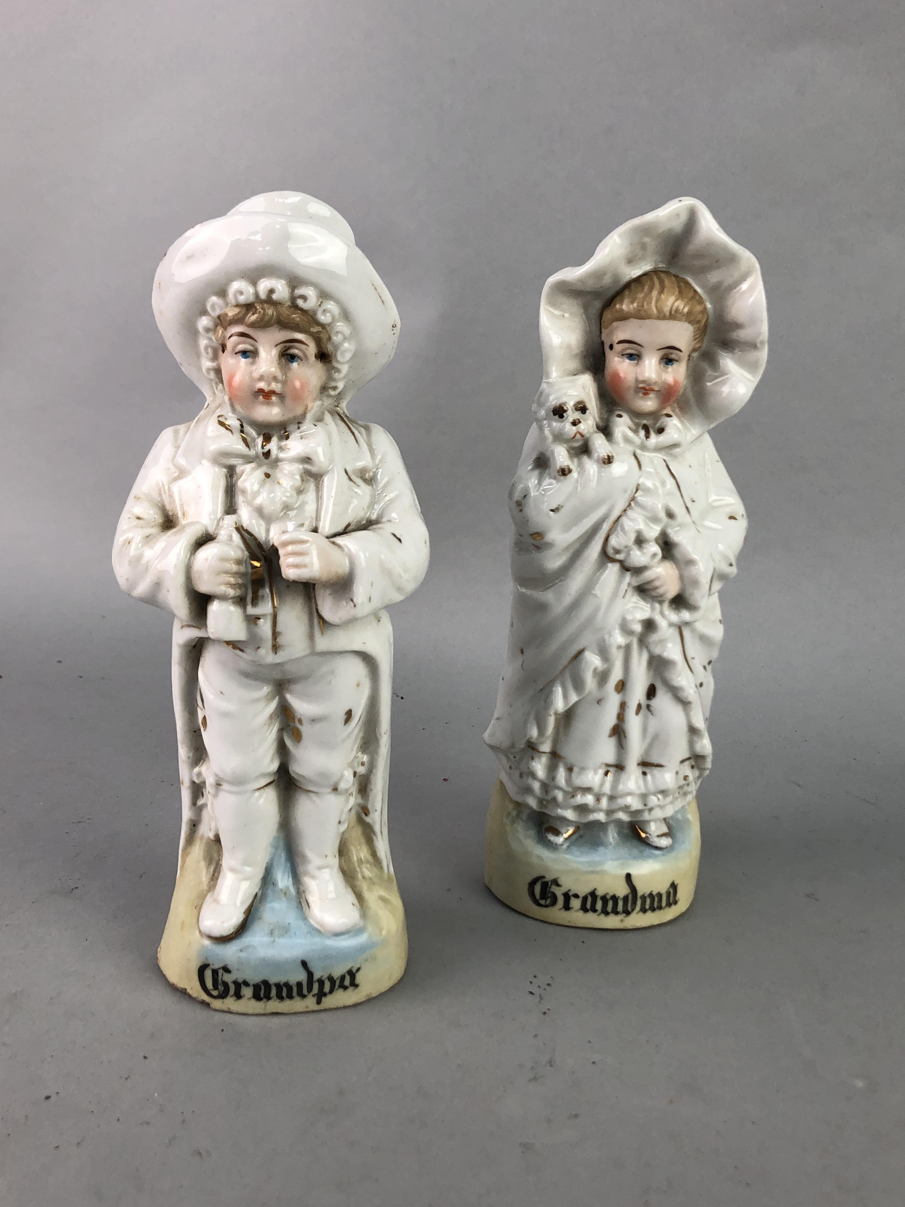 A PAIR OF GERMAN FIGURES OF 'GRANDPA' AND 'GRANDMA'