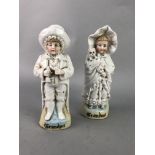 A PAIR OF GERMAN FIGURES OF 'GRANDPA' AND 'GRANDMA'