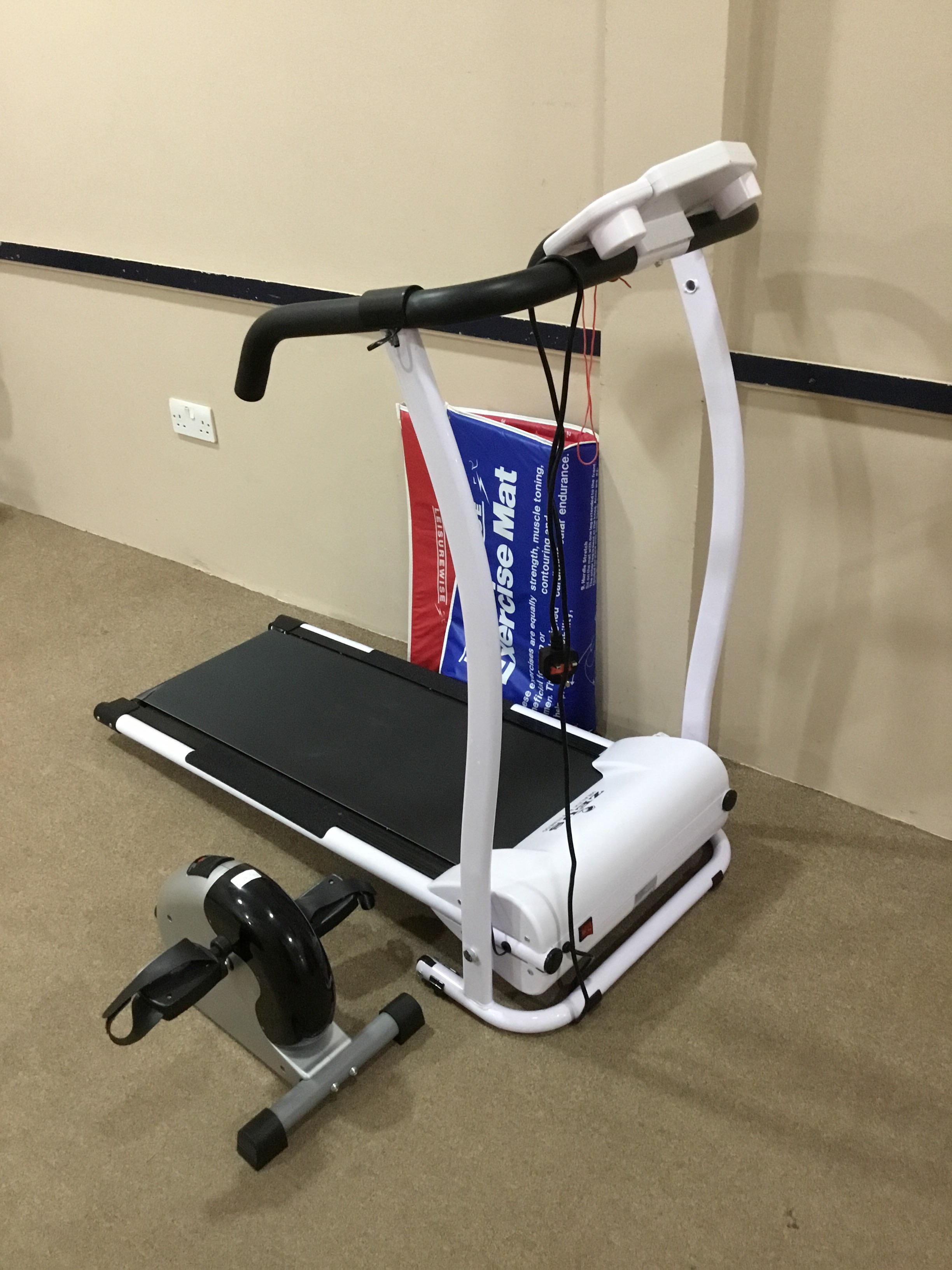 A ZEUS HEALTH & FITNESS TREADMILL AND A PEDAL MACHINE