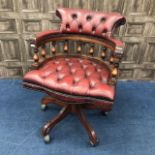AN OXBLOOD LEATHER SWIVEL CAPTAIN'S CHAIR