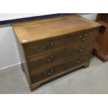 A MAHOGANY CHEST OF DRAWERS