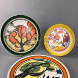 A COLLECTION OF ART DECO STYLE CIRCULAR PLATES