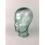 AN ART DECO STYLE GLASS MODEL OF A LADY'S HEAD