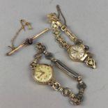 A LADY'S TUDOR WRISTWATCH, ANOTHER WRISTWATCH AND A BROOCH