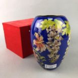 A JAPANESE LILY AND WISTERIA CLOISONNE ENAMEL VASE
