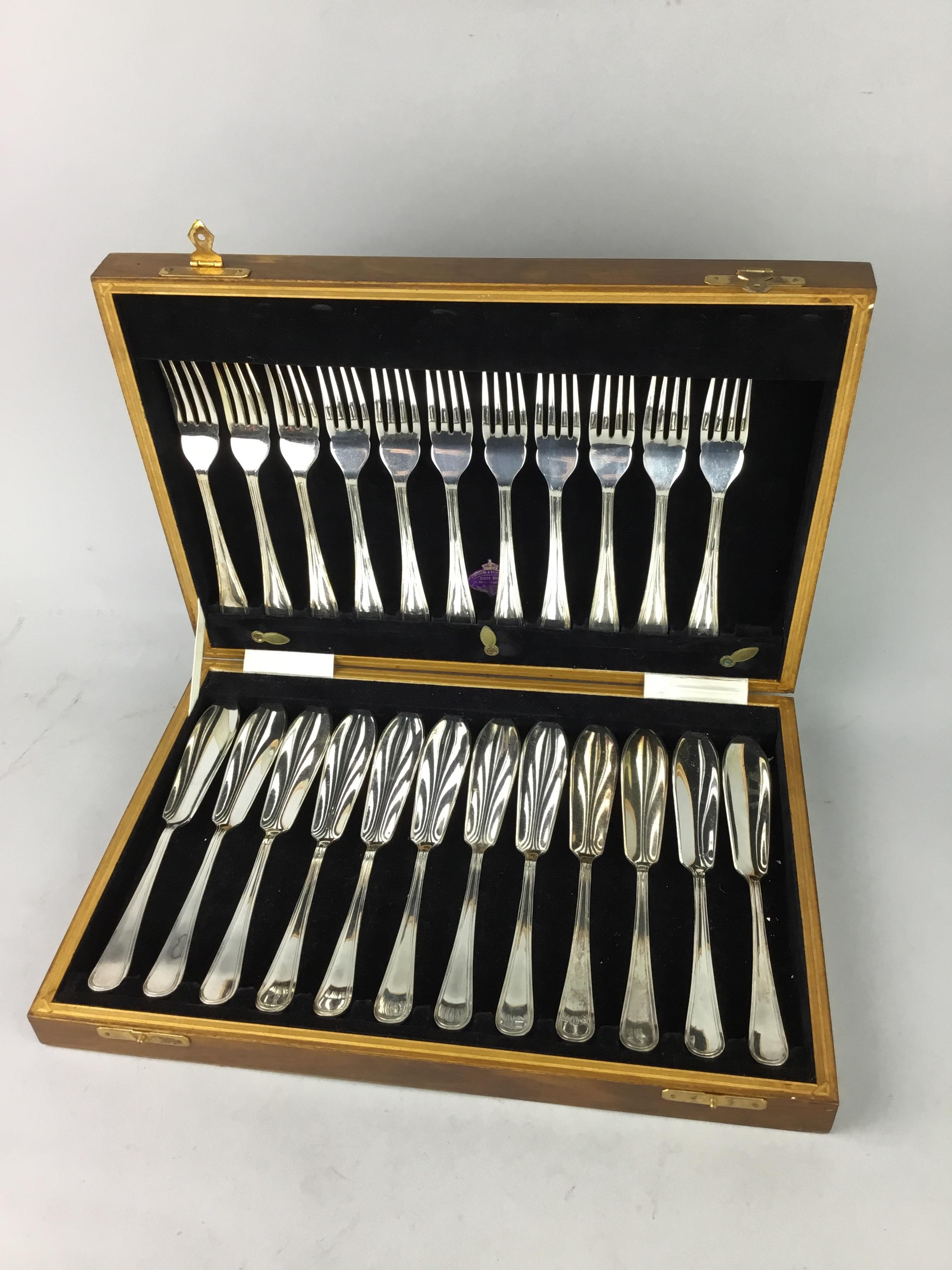 A DYKES BROTHERS CANTEEN OF SILVER PLATED CUTLERY AND ANOTHER