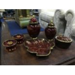 TWO CARLTON WARE LIDDED VASES, A JAR, TWO CANDLESTICKS AND TWO DISHES