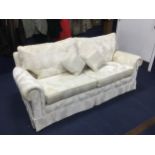 A MODERN CREAM THREE PIECE LOUNGE SUITE