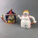 A GROUP OF NOVELTY CERAMIC TEAPOTS