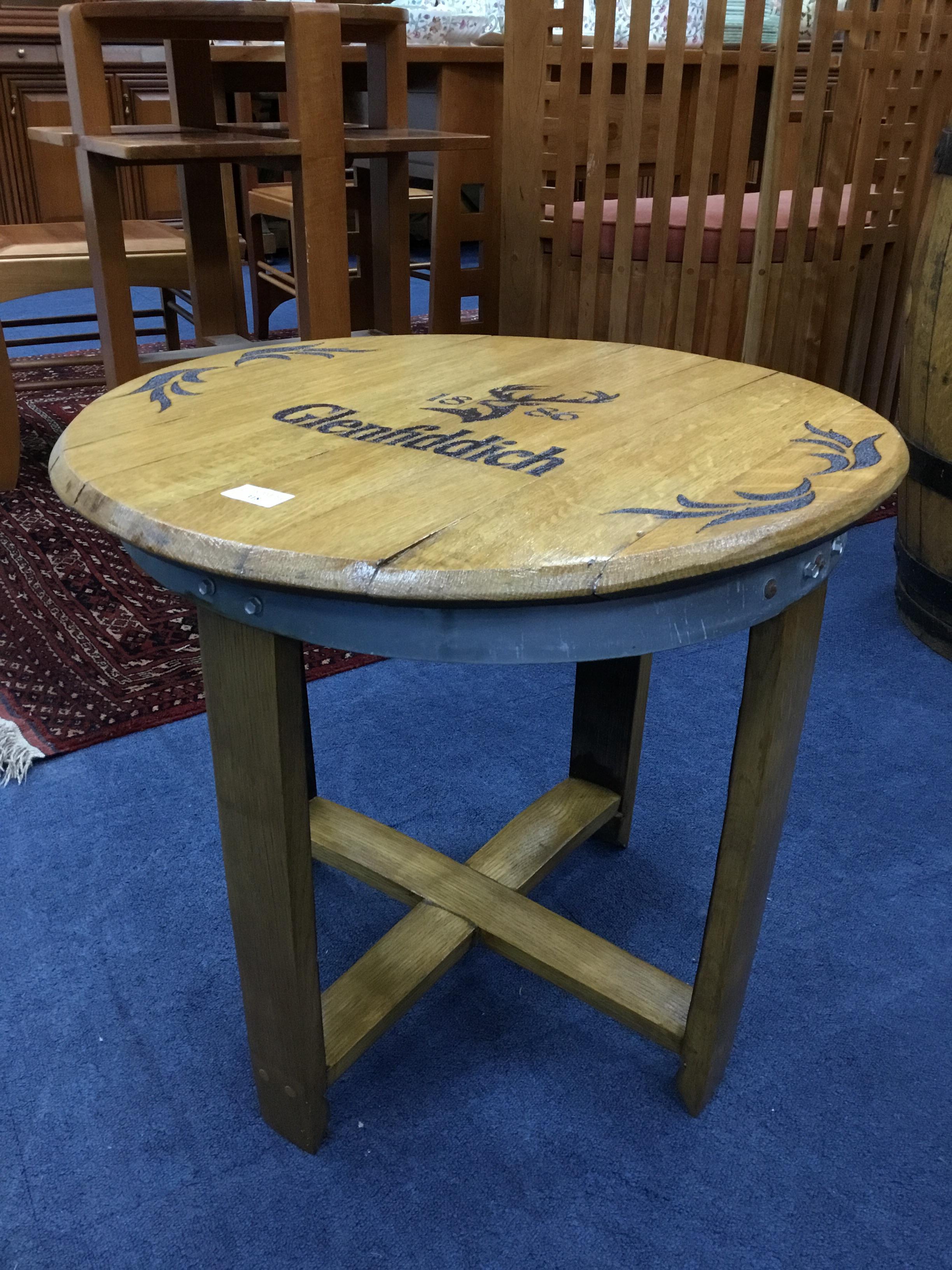 AN OAK CIRCULAR OCCASIONAL TABLE