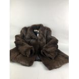A FUR JACKET AND THREE CERAMIC TABLE LAMPS