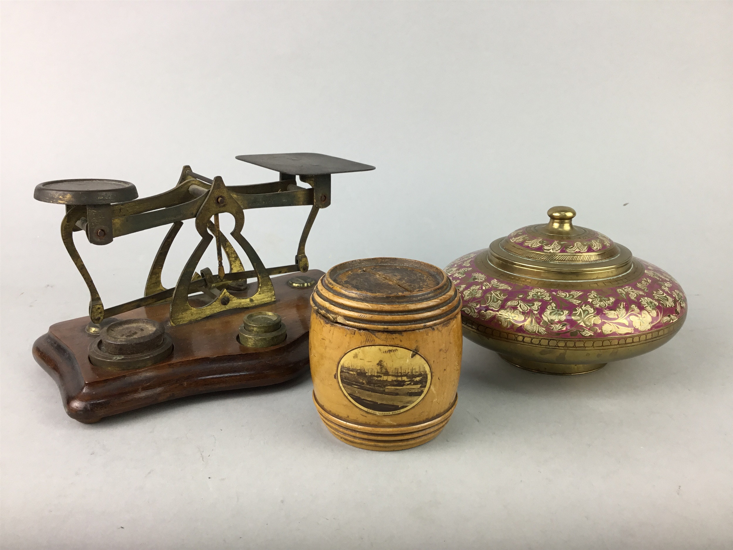 A MAUCHLINE WARE MONEY BOX, SCALES AND OTHER ITEMS