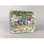 A CANTON FAMILLE ROSE RECTANGULAR DISH AND SEVEN JAPANESE FIGURES