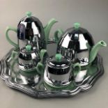 AN ART DECO CHROME JACKETED FOUR PIECE TEA SERVICE