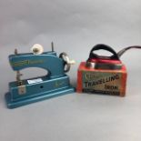 A VULCON JUNIOR SEWING MACHINE AND A CLEM TRAVELLING IRON