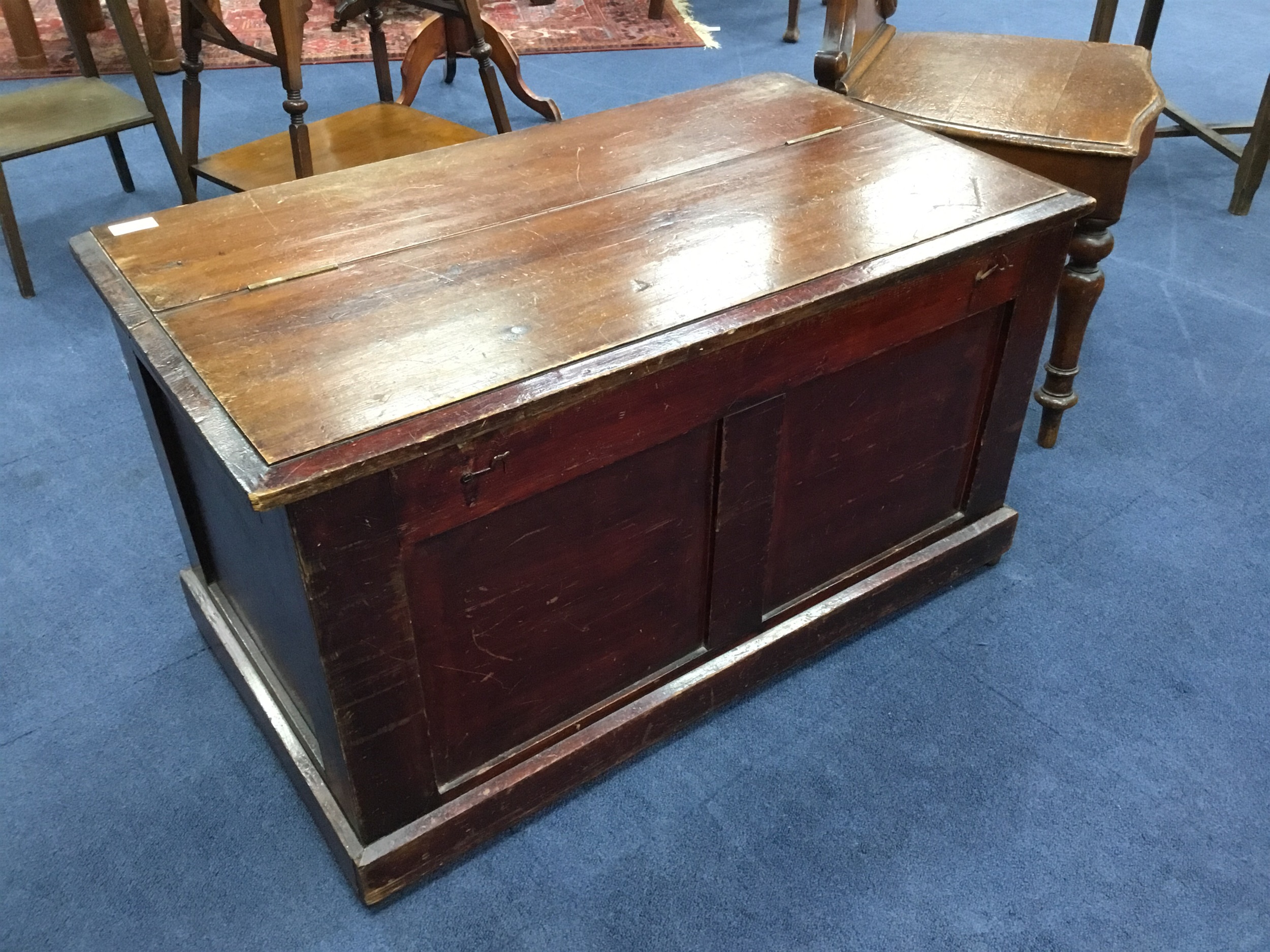 A STAINED WOOD BLANKET CHEST AND A HALL CHAIR