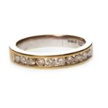 A DIAMOND HALF ETERNITY RING