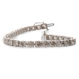 A DIAMOND TENNIS BRACELET