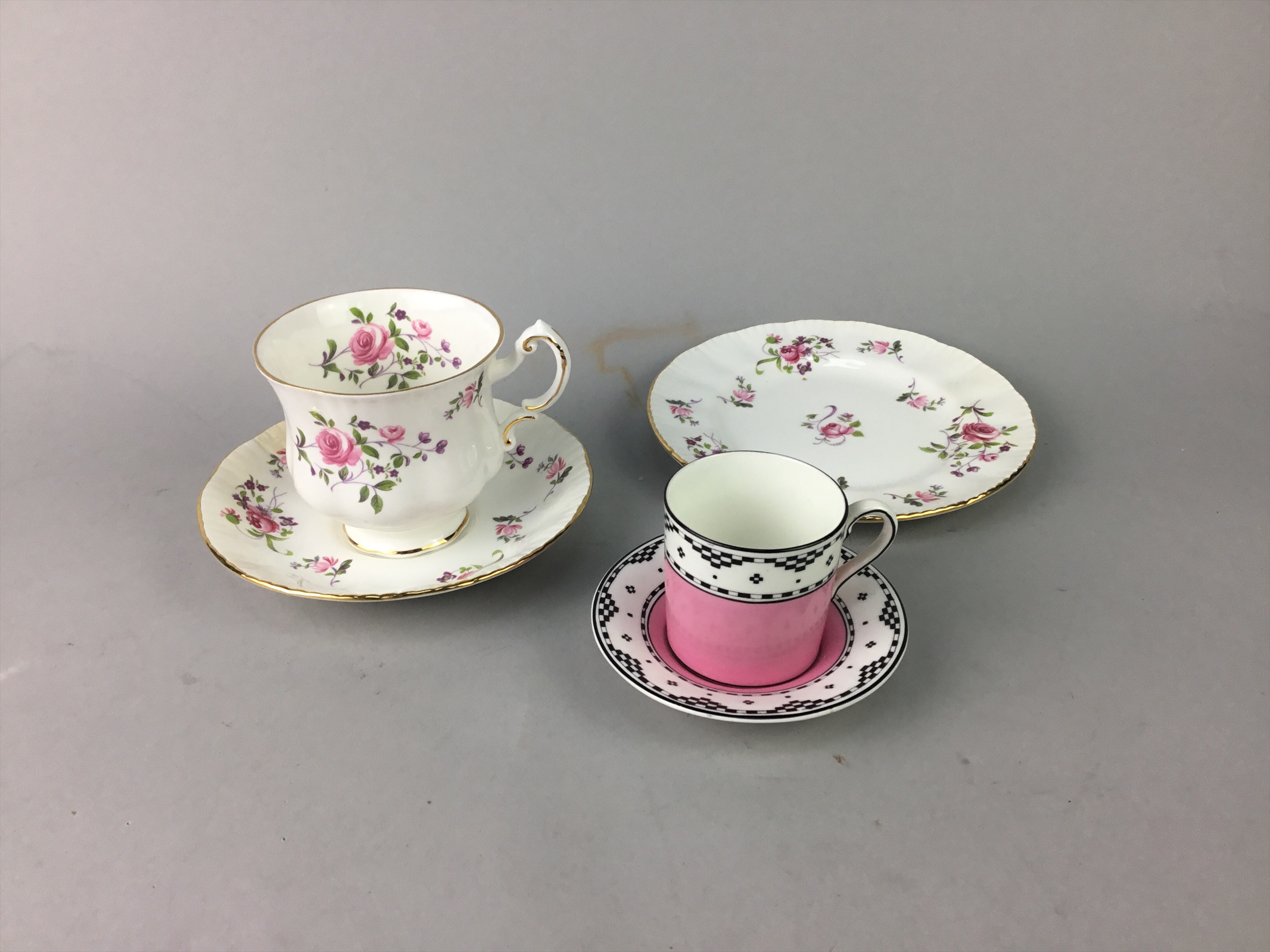 A LATE VICTORIAN FLORAL PAINTED AND GILT PART TEA SERVICE AND OTHER CHINA