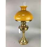 AN EARLY 20TH CENTURY OIL LAMP