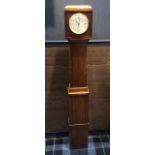 A MAHOGANY GRANDMOTHER CLOCK