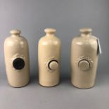 A LOT OF THREE EARLY 20TH CENTURY CERAMIC HOT WATER BOTTLES