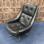 A 1960'S RETRO SWIVEL ARM CHAIR