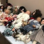 LARGE LOT OF PORCELAIN DOLLS, in various vintage dress, with some boxed examples