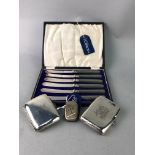 A SILVER AND ENAMEL VESTA CASE, CIGARETTE CASES AND KNIVES