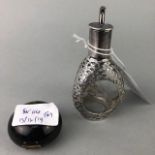 A HONG KONG STERLING MOUNTED PERFUME BOTTLE AND A SIMULATED TORTOISESHELL PILL BOX