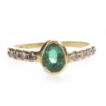 A GREEN GEM AND DIAMOND RING