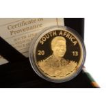 A GOLD NELSON MANDELA GOLD COIN