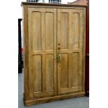 A PINE KITCHEN CUPBOARD WITH PANELLED DOORS, EARLY 20TH C, 185CM H; 127 X 39CM