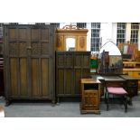 A THREE PIECE CARVED OAK BEDROOM SUITE, COMPRISING DRESSING TABLE, TALLBOY AND WARDROBE, 193CM H;