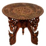 A SOUTH EAST ASIAN CARVED HARDWOOD TRAY TOPPED TABLE ON STAND, 59CM H X 63CM D